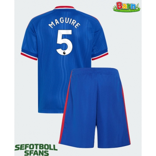 Manchester United Harry Maguire #5 Bortaställ Barn 2026-27 Kortärmad (+ Korta byxor) Manchester United Harry Maguire #5 Bortaställ Barn 2026-27 Kortärmad (+ Korta byxor)